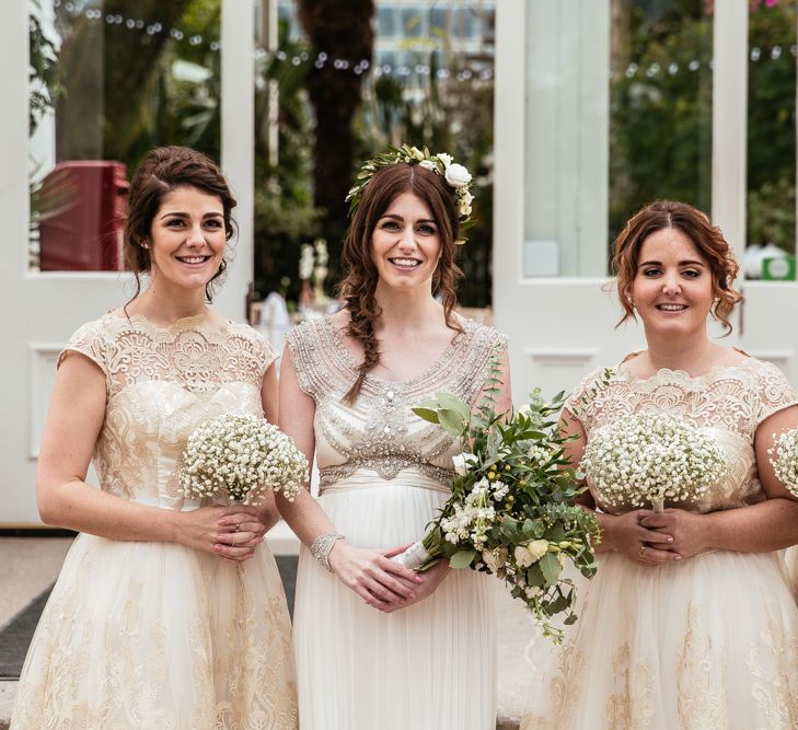 Bridesmaids in Gold Lace Chi Chi London Dresses from ASOS