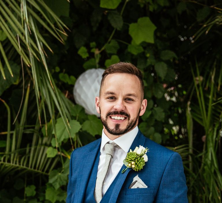 Groom in Ted Baker Suit