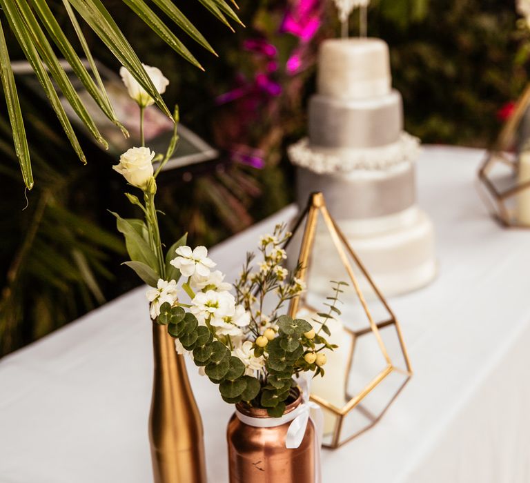 Spray Painted Bottles Wedding Decor