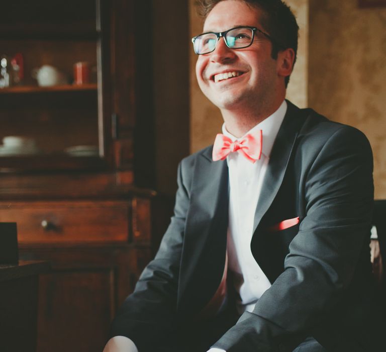 Groom in Coral Bow Tie