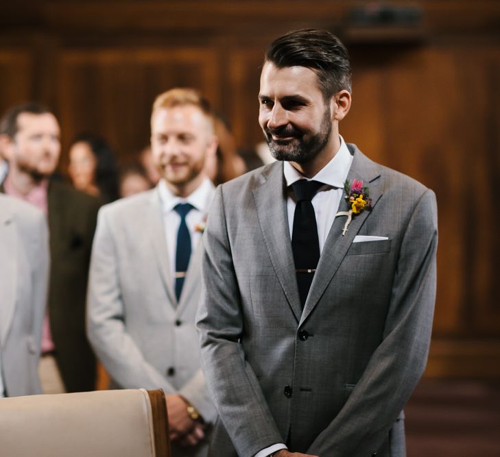 Groom Waiting at the Altar