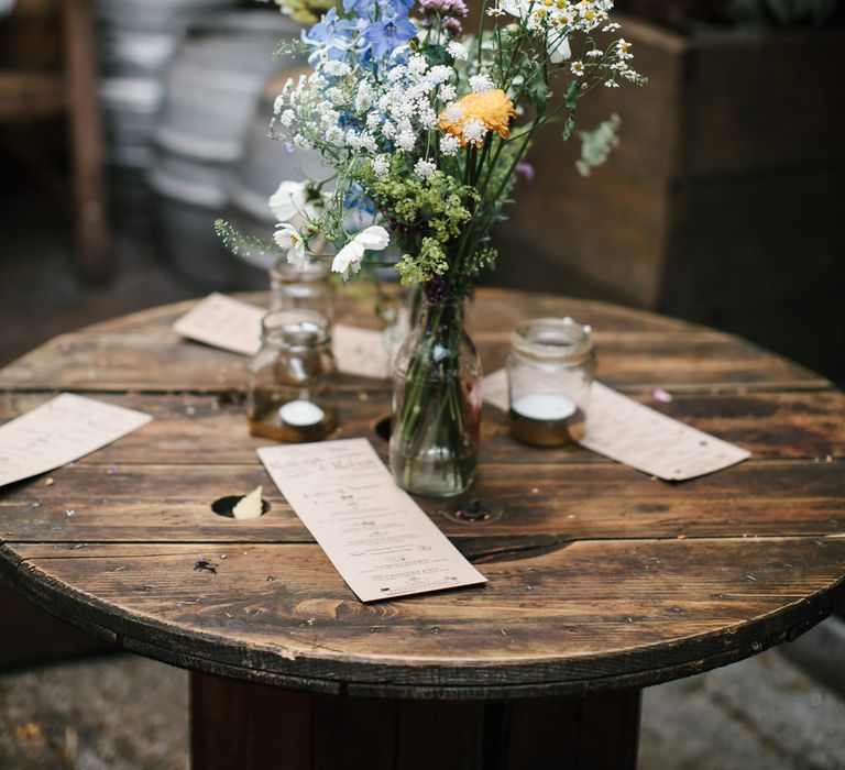 Wild Flower Table Arrangement & Kraft Paper Wedding Stationery