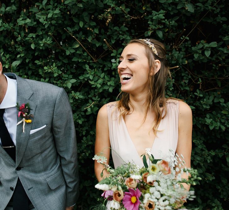 Laughing Bride & Groom