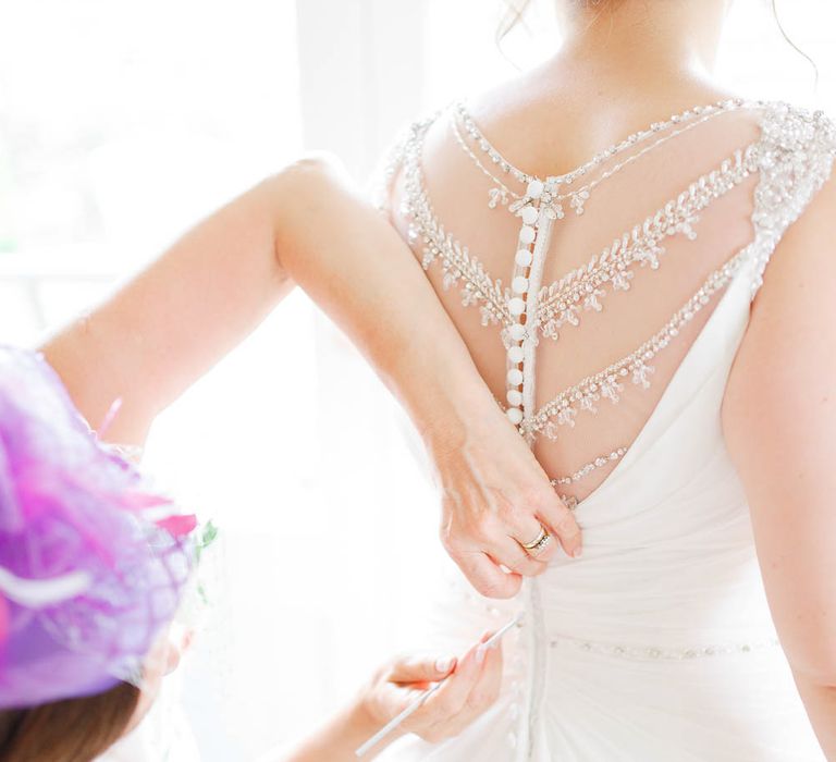 Bridal Preparations | Bride in Ellis Bridal Gown | Romantic Pastel Wedding at Cripps Barn | White Stag Wedding Photography | Dan Hodge Wedding Films