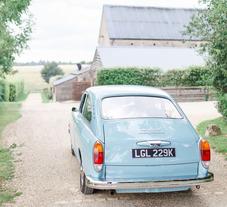 Blue Vintage Wedding Car | Romantic Pastel Wedding at Cripps Barn | White Stag Wedding Photography | Dan Hodge Wedding Films