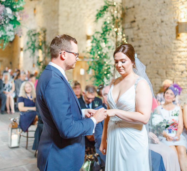 Barn Wedding Ceremony | Bride in Ellis Bridal Gown | Groom in Dyfed Menswear Navy Suit | Romantic Pastel Wedding at Cripps Barn | White Stag Wedding Photography | Dan Hodge Wedding Films