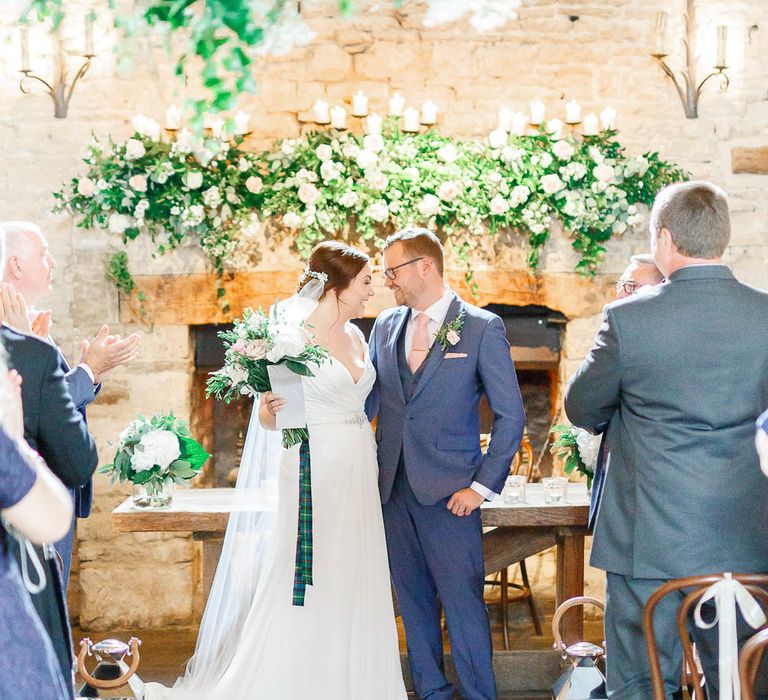 Barn Wedding Ceremony | Bride in Ellis Bridal Gown | Groom in Dyfed Menswear Navy Suit | Romantic Pastel Wedding at Cripps Barn | White Stag Wedding Photography | Dan Hodge Wedding Films