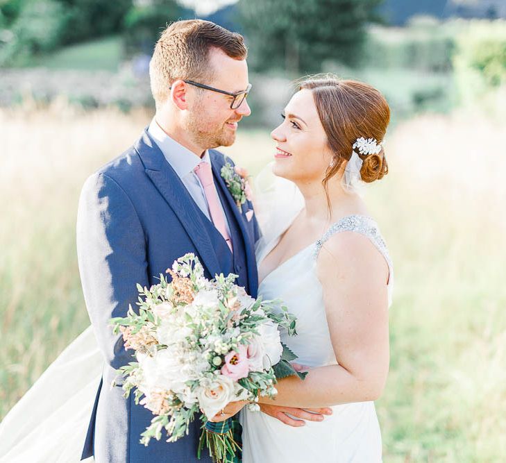 Bride in Ellis Bridal Gown | Groom in Dyfed Menswear Navy Suit | Romantic Pastel Wedding at Cripps Barn | White Stag Wedding Photography | Dan Hodge Wedding Films