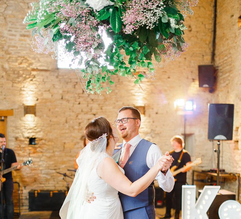 First Dance | Bride in Ellis Bridal Gown | Groom in Dyfed Menswear Navy Suit | Romantic Pastel Wedding at Cripps Barn | White Stag Wedding Photography | Dan Hodge Wedding Films