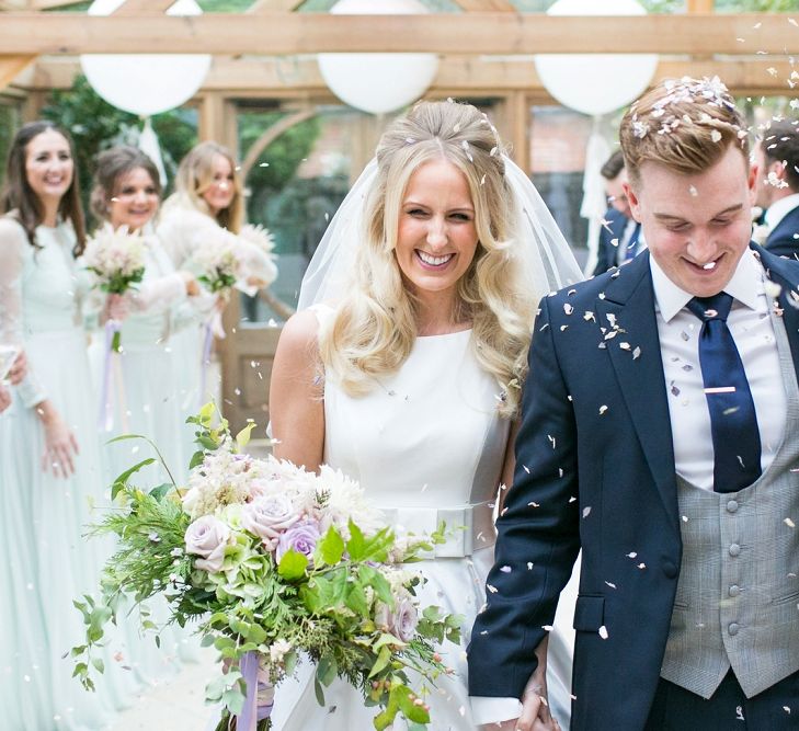 Confetti Moment | Bride in Sassi Holdford Bryony Wedding Dress | Pastel Wedding at Gaynes Park | Anneli Marinovich Photography