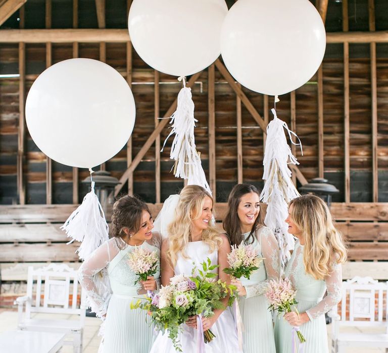 Giant Balloons & Tissue Tassels | Bridesmaids in Mint Green ASOS Dresses | Bride in Sassie Holdford Bryony Wedding Dress | Pastel Wedding at Gaynes Park | Anneli Marinovich Photography