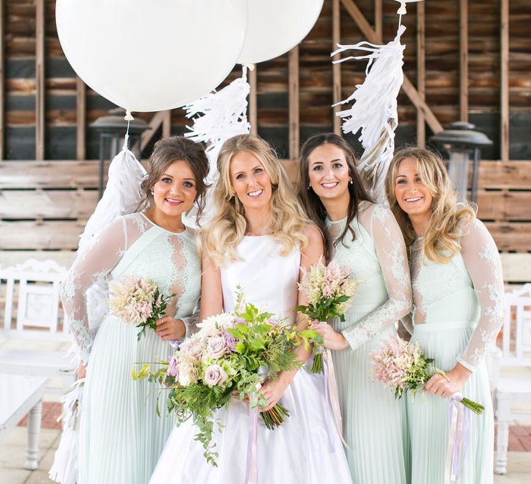 Giant Balloons & Tissue Tassels | Bridesmaids in Mint Green ASOS Dresses | Bride in Sassie Holdford Bryony Wedding Dress | Pastel Wedding at Gaynes Park | Anneli Marinovich Photography