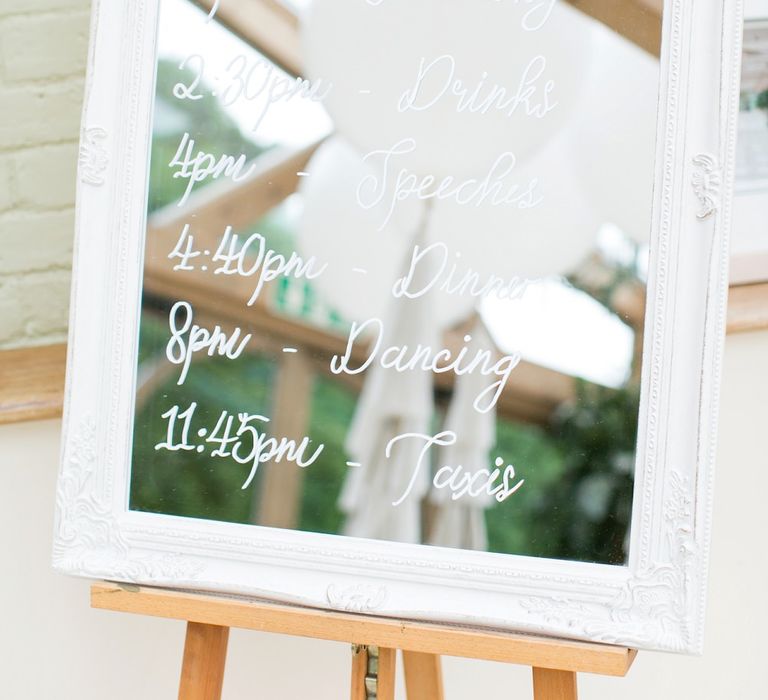 White Frame Mirror Order of The Day Sign | Pastel Wedding at Gaynes Park | Anneli Marinovich Photography