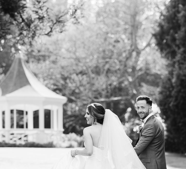 Bride in Ronald Joyce Wedding Dress | Groom in Grey Moss Bros Suit | The Orangery Maidstone | Lucie Watson Photography | TDH Media Films