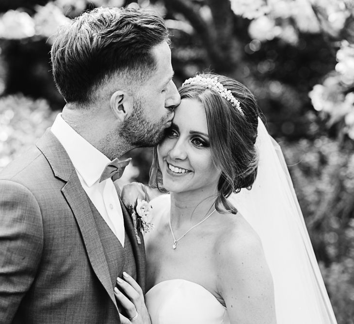 Bride in Ronald Joyce Wedding Dress | Groom in Grey Moss Bros Suit | The Orangery Maidstone | Lucie Watson Photography | TDH Media Films