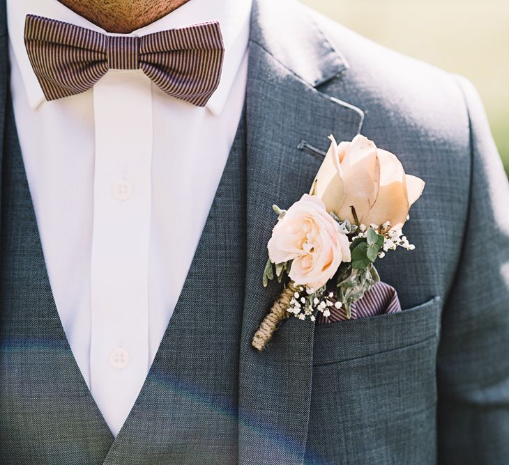 Vintage Rose Buttonhole | Groom in Grey Moss Bros Suit | The Orangery Maidstone | Lucie Watson Photography | TDH Media Films