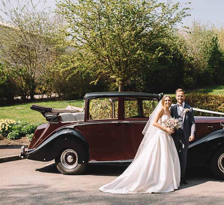 Bride in Ronald Joyce Wedding Dress | Groom in Grey Moss Bros Suit | The Orangery Maidstone | Lucie Watson Photography | TDH Media Films