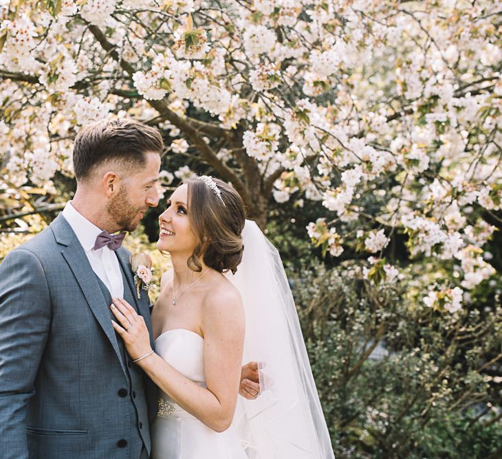 Bride in Ronald Joyce Wedding Dress | Groom in Grey Moss Bros Suit | The Orangery Maidstone | Lucie Watson Photography | TDH Media Films