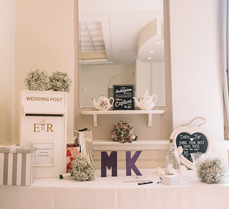 Wedding Decor | Bride in Ronald Joyce Wedding Dress | Groom in Grey Moss Bros Suit | The Orangery Maidstone | Lucie Watson Photography | TDH Media Films