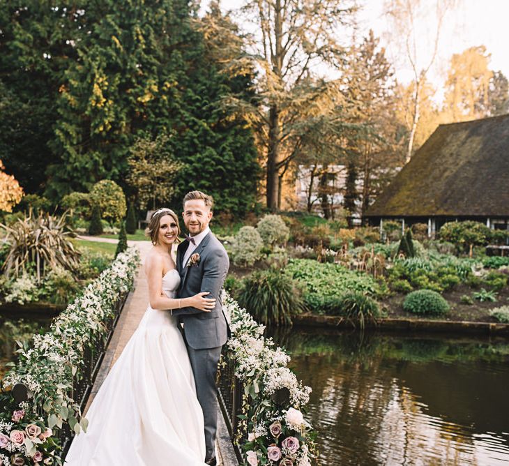 Bride in Ronald Joyce Bridal Gown | Groom in Grey Moss Bros Suit | The Orangery Maidstone | Lucie Watson Photography | TDH Media Films