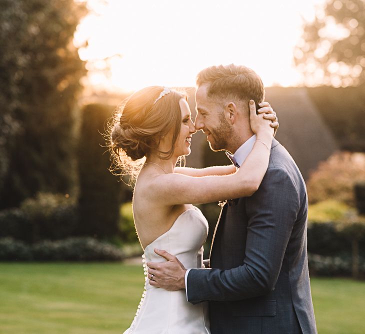 Sunset | Bride in Ronald Joyce Bridal Gown | Groom in Grey Moss Bros Suit | The Orangery Maidstone | Lucie Watson Photography | TDH Media Films