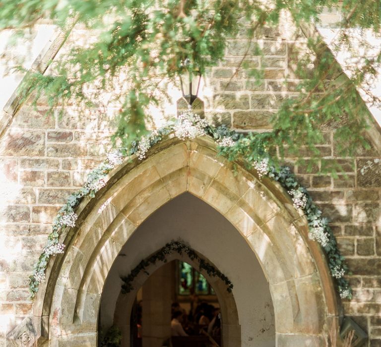 Archway Outside Church Floral Arch