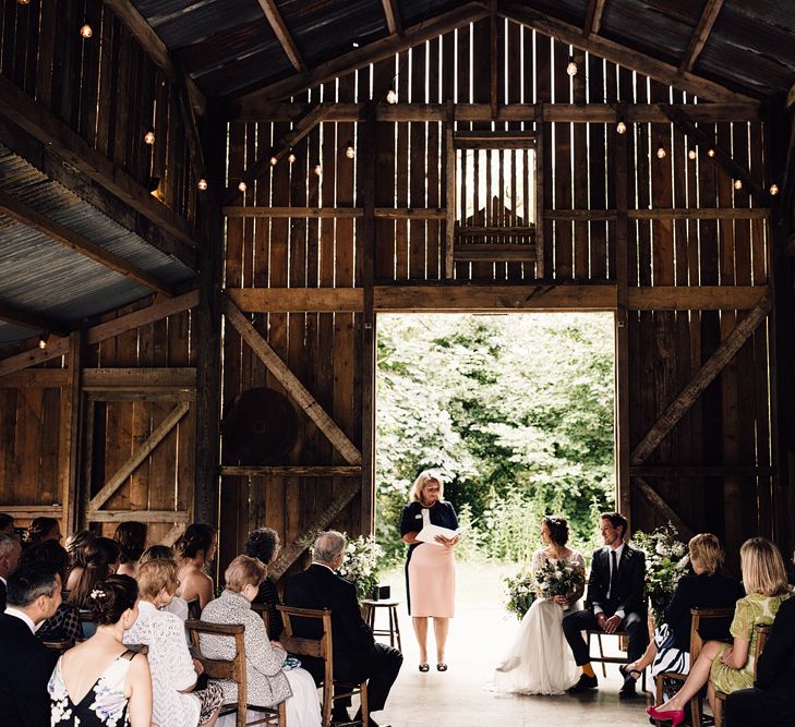 Wedding Ceremony | Bride in Catherine Deane Gown | Groom in Grey Edit Suits Suit | Rustic Barn Wedding at Nancarrow Farm, Cornwall | Samuel Docker Photography