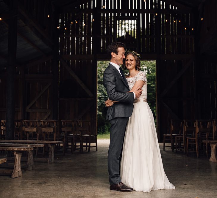 Bride in Catherine Deane Gown | Groom in Grey Edit Suits Suit | Rustic Barn Wedding at Nancarrow Farm, Cornwall | Samuel Docker Photography