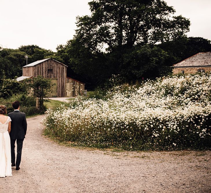 Bride in Catherine Deane Gown | Groom in Grey Edit Suits Suit | Rustic Barn Wedding at Nancarrow Farm, Cornwall | Samuel Docker Photography