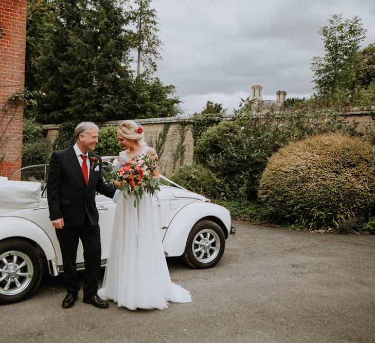 Bridal Entrance in Lace & Tulle Wedding Gown | Colourful DIY Barn Wedding at The Manor Barn, Cambridge | Meghan Lorna Photography