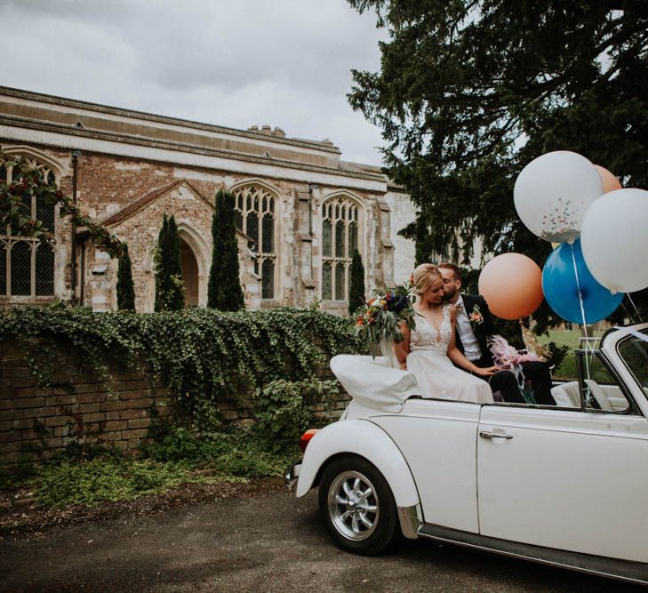 Giant Balloons | Bride in Lace & Tulle Gown | Groom in Suit & Bow Tie | Colourful DIY Barn Wedding at The Manor Barn, Cambridge | Meghan Lorna Photography