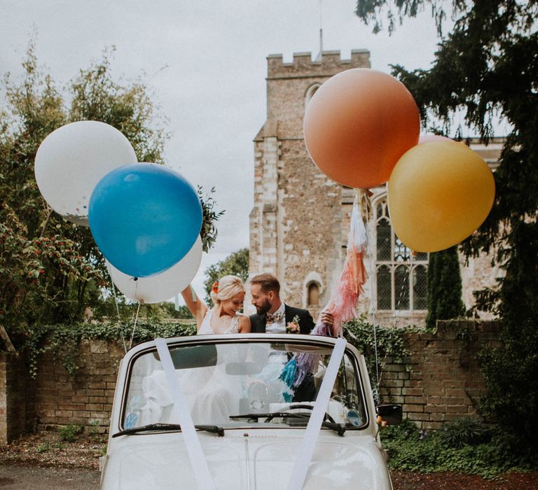 Giant Balloons | Bride in Lace & Tulle Gown | Groom in Suit & Bow Tie | Colourful DIY Barn Wedding at The Manor Barn, Cambridge | Meghan Lorna Photography