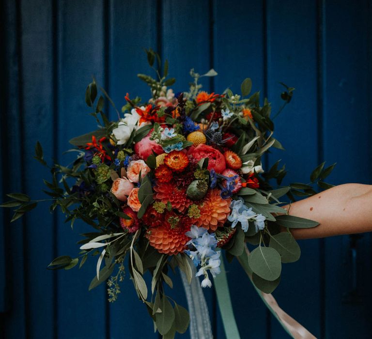 Red & Orange Wedding Bouqet with Dahlias & Ribbons | Colourful DIY Barn Wedding at The Manor Barn, Cambridge | Meghan Lorna Photography