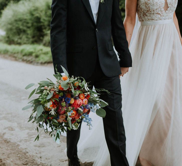 Bride Bridal Bouquet | Bride in Lace & Tulle Gown | Groom in Black Suit & Liberty Print Bow Tie | Colourful DIY Barn Wedding at The Manor Barn, Cambridge | Meghan Lorna Photography