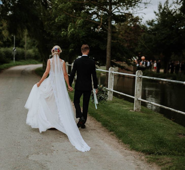 Bride in Lace & Tulle Gown | Groom in Black Suit & Liberty Print Bow Tie | Colourful DIY Barn Wedding at The Manor Barn, Cambridge | Meghan Lorna Photography