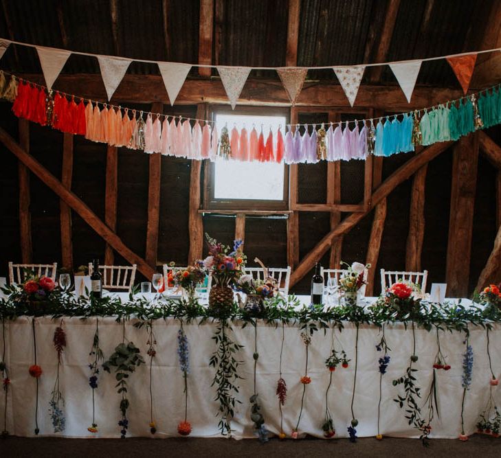 Top Table Wedding Decor | Rainbow Tassels | Colourful DIY Barn Wedding at The Manor Barn, Cambridge | Meghan Lorna Photography