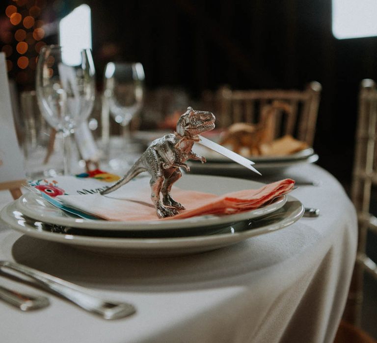 Spray Painted Dinosaur Place Setting | Colourful DIY Barn Wedding at The Manor Barn, Cambridge | Meghan Lorna Photography