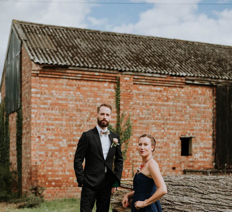 Groom in Black Suit & Liberty Print Bow Tie | Colourful DIY Barn Wedding at The Manor Barn, Cambridge | Meghan Lorna Photography