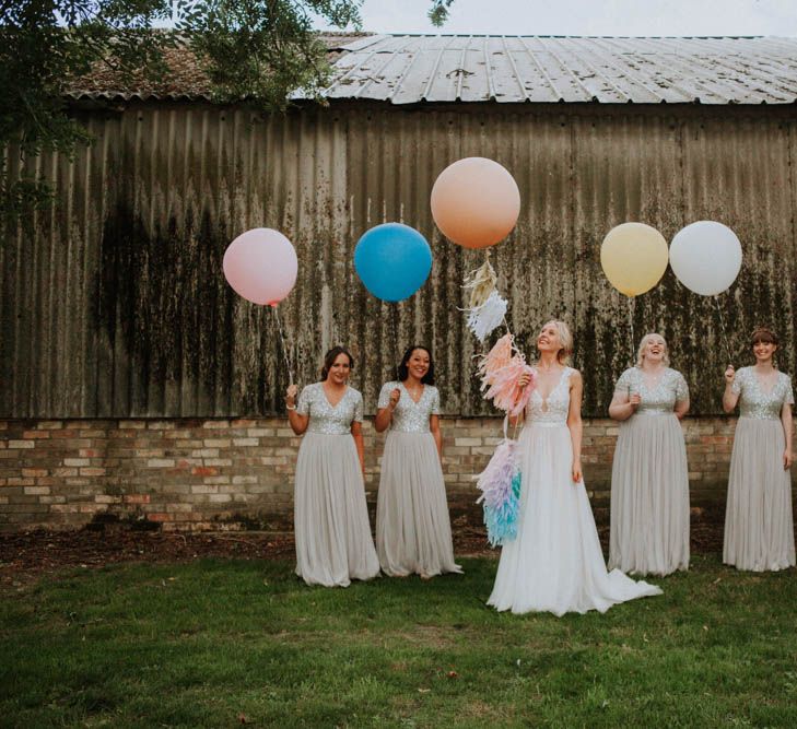 Giant Balloons | Bride in Lace Wedding Dress | Bridesmaids in Pale Blue ASOS Dresses | Colourful DIY Barn Wedding at The Manor Barn, Cambridge | Meghan Lorna Photography