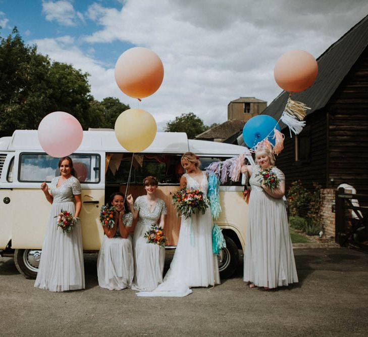 Giant Balloons | Colourful DIY Barn Wedding at The Manor Barn, Cambridge | Bride in Lace Wedding Dress | Bridesmaids in Pale Blue ASOS Dresses | Meghan Lorna Photography