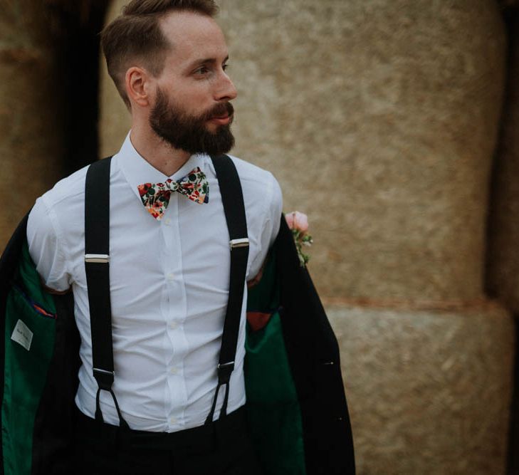 Groom in Liberty Print Bow Tie & Braces | Colourful DIY Barn Wedding at The Manor Barn, Cambridge | Meghan Lorna Photography