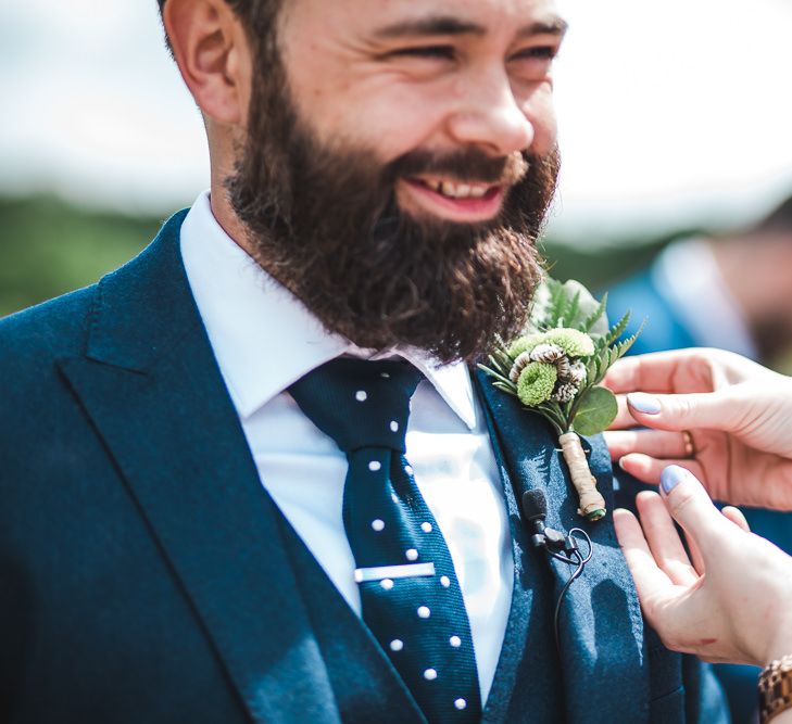 Buttonhole | PapaKåta Sperry Tent at Chafford Park in Kent Countryside | Eve Dunlop Photography | Roost Film Co.