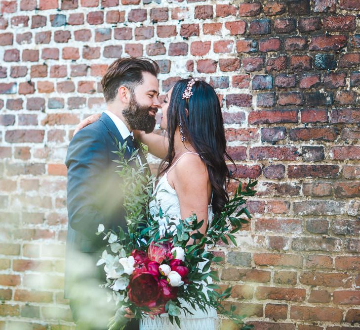 Bride in Self Portrait Dress | Groom in Navy Suit | PapaKåta Sperry Tent at Chafford Park in Kent Countryside | Eve Dunlop Photography | Roost Film Co.