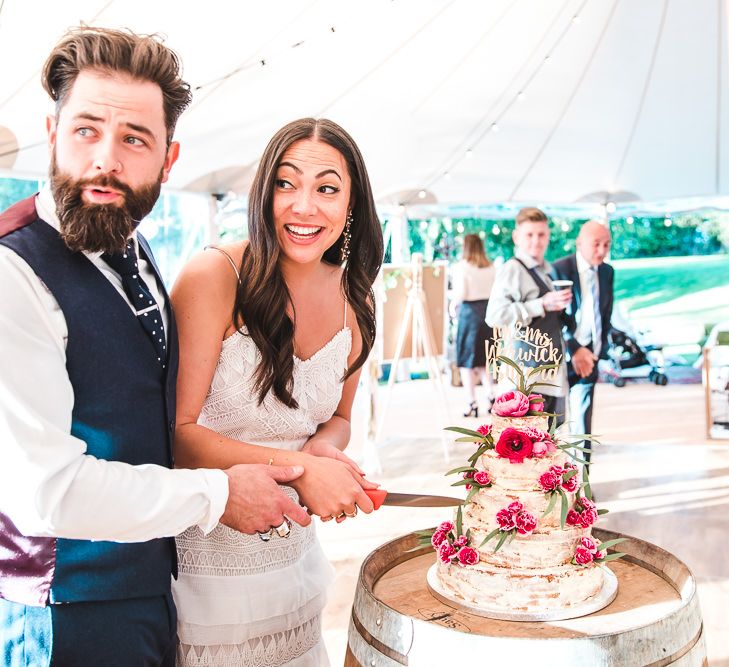 Cutting the Cake | PapaKåta Sperry Tent at Chafford Park in Kent Countryside | Eve Dunlop Photography | Roost Film Co.