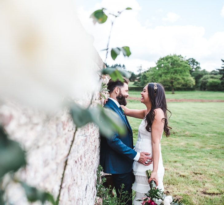 Bride in Self Portrait Dress | Groom in Navy Suit | PapaKåta Sperry Tent at Chafford Park in Kent Countryside | Eve Dunlop Photography | Roost Film Co.