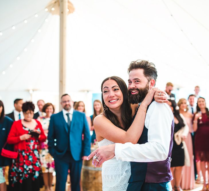 First Dance | Bride in Self Portrait Dress | Groom in Navy Suit | PapaKåta Sperry Tent at Chafford Park in Kent Countryside | Eve Dunlop Photography | Roost Film Co.