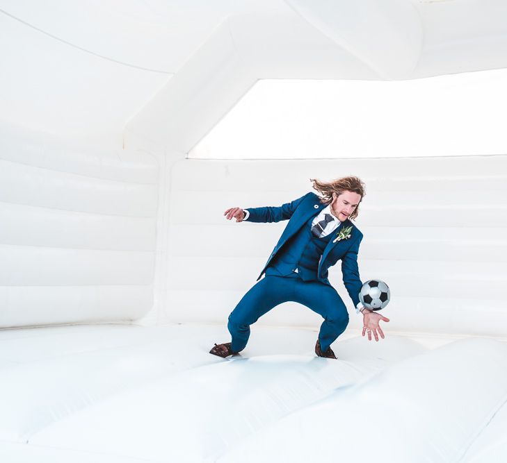 Bouncy Castle | PapaKåta Sperry Tent at Chafford Park in Kent Countryside | Eve Dunlop Photography | Roost Film Co.