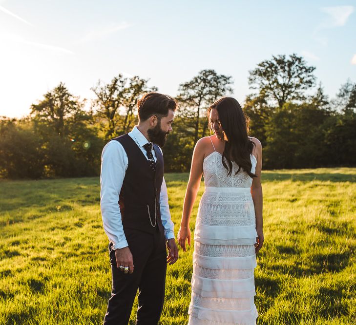 Bride in Self Portrait Dress | Groom in Navy Suit | PapaKåta Sperry Tent at Chafford Park in Kent Countryside | Eve Dunlop Photography | Roost Film Co.