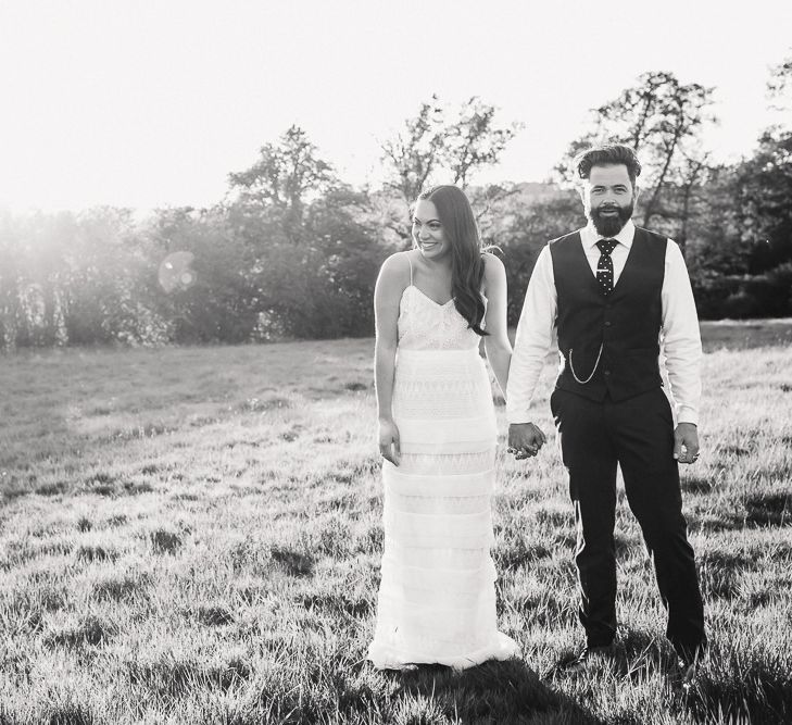 Bride in Self Portrait Dress | Groom in Navy Suit | PapaKåta Sperry Tent at Chafford Park in Kent Countryside | Eve Dunlop Photography | Roost Film Co.