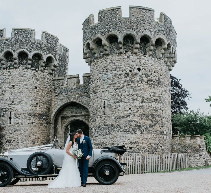 Bride in Mori Lee Gown | Groom in Ted Baker Suit from Moss Bros | Cooling Castle Barn Wedding | Michelle Cordner Photography